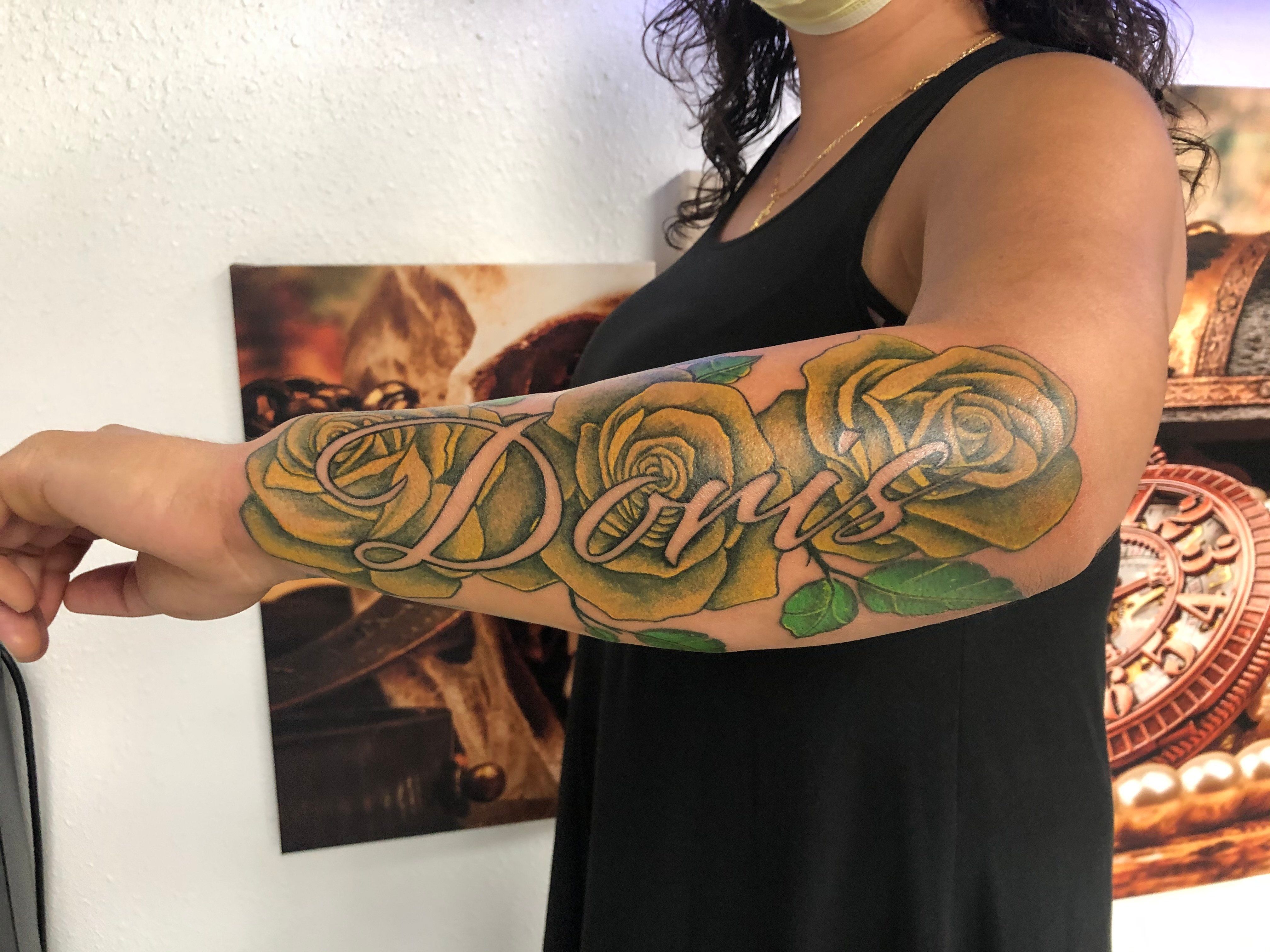 Doris Name Arm Tattoo