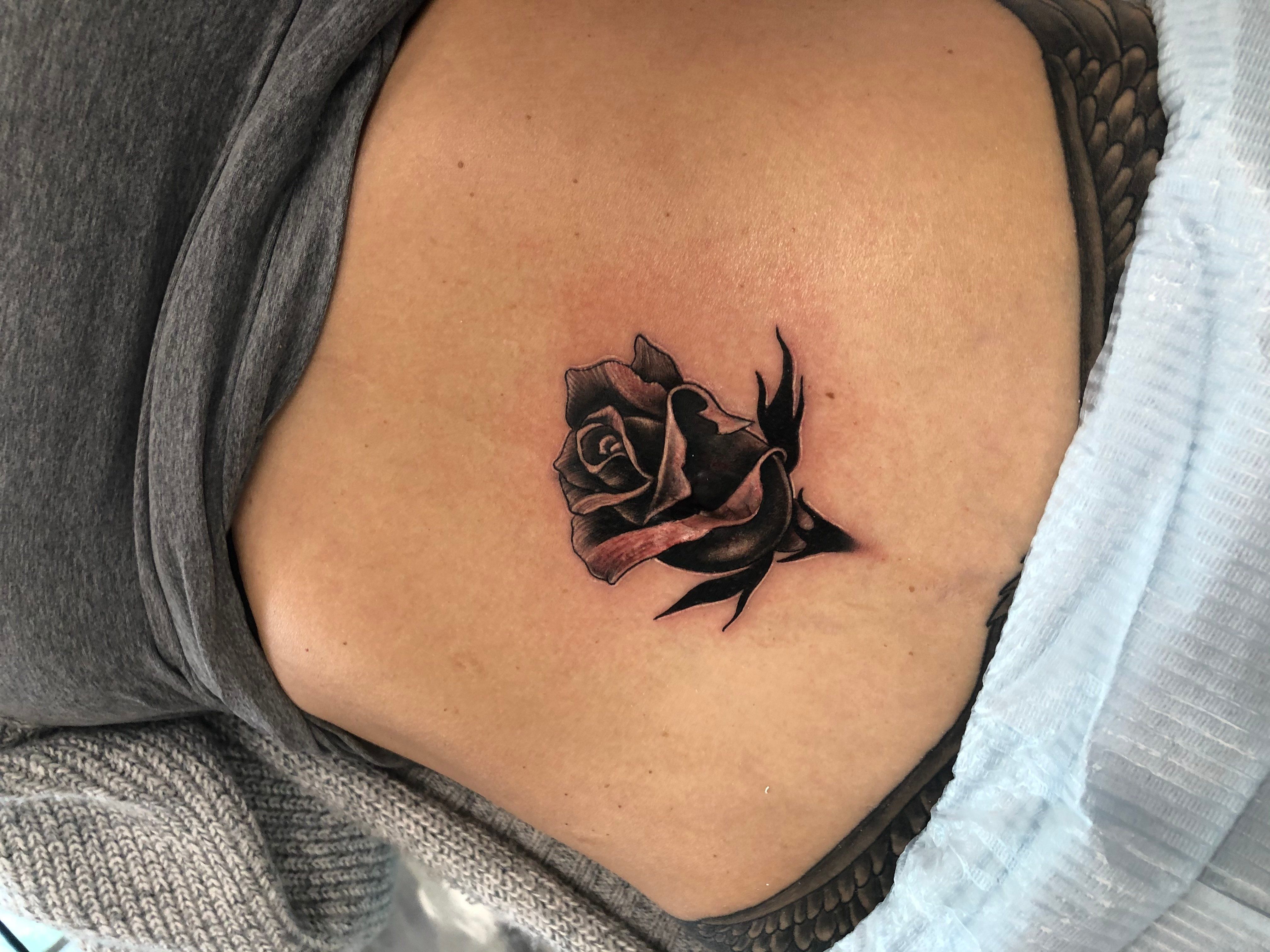 Black Rose Belly Tattoo