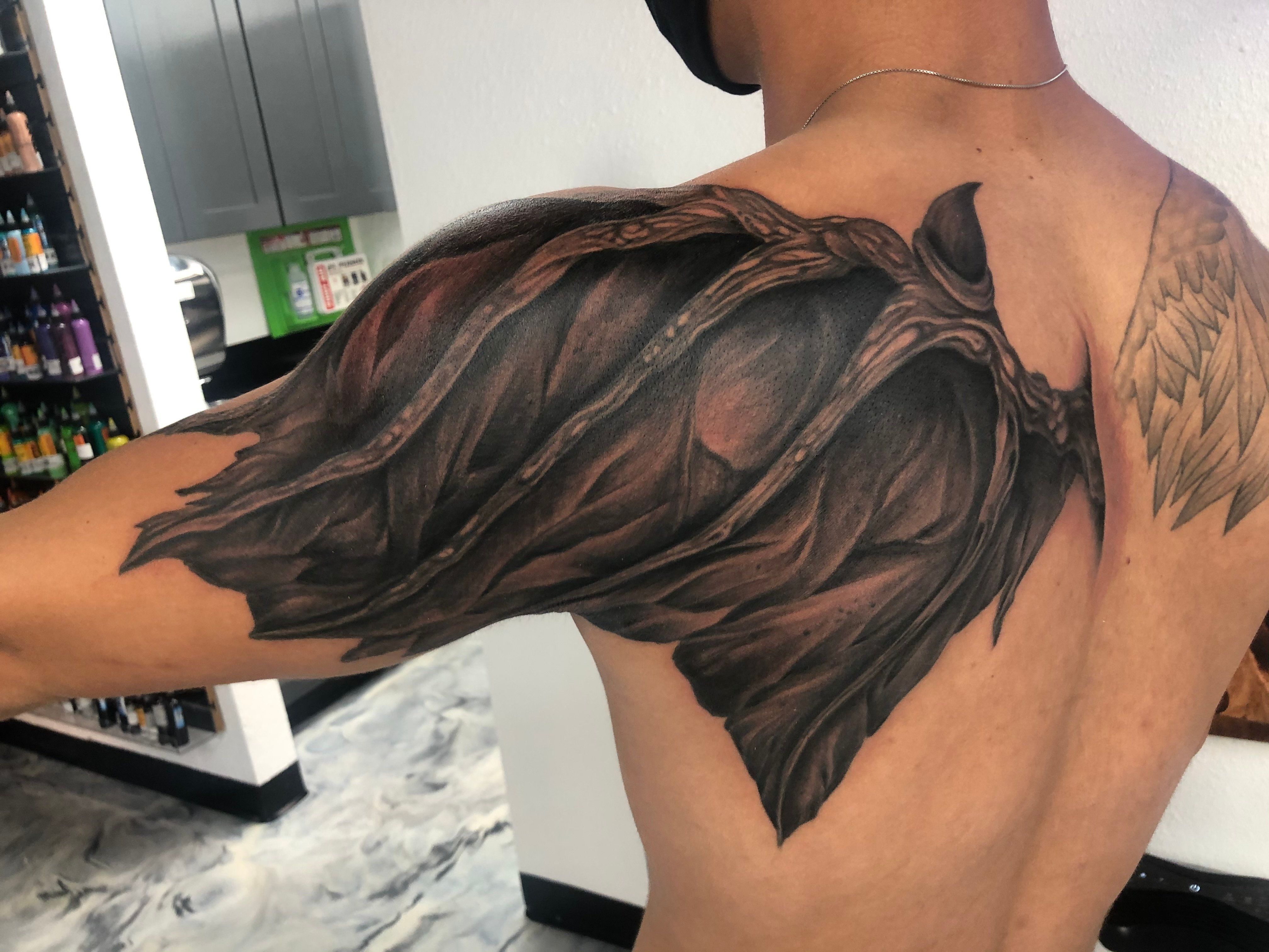 Black Wing Back Tattoo