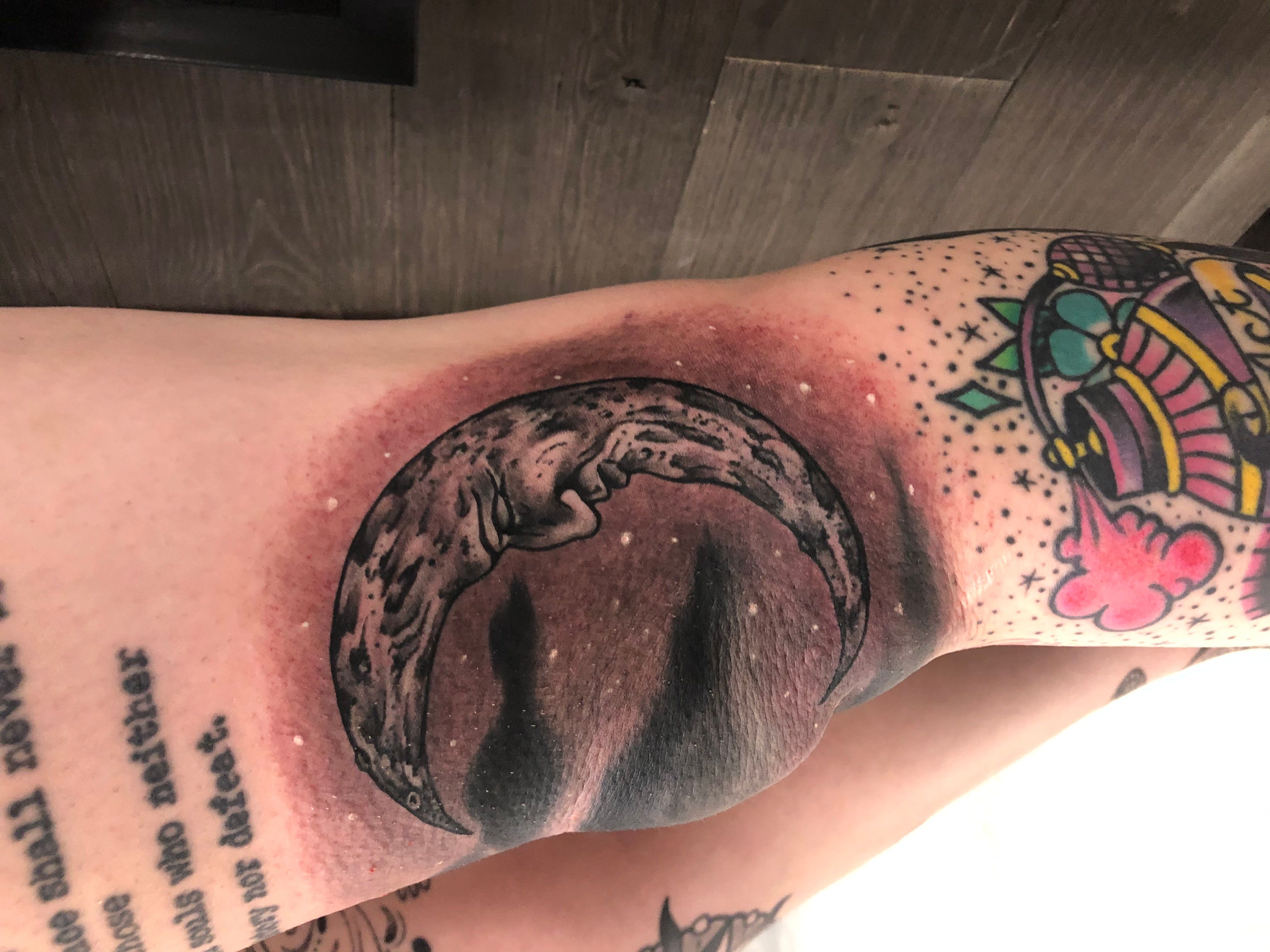 Crescent Moon With Face Knee Tattoo