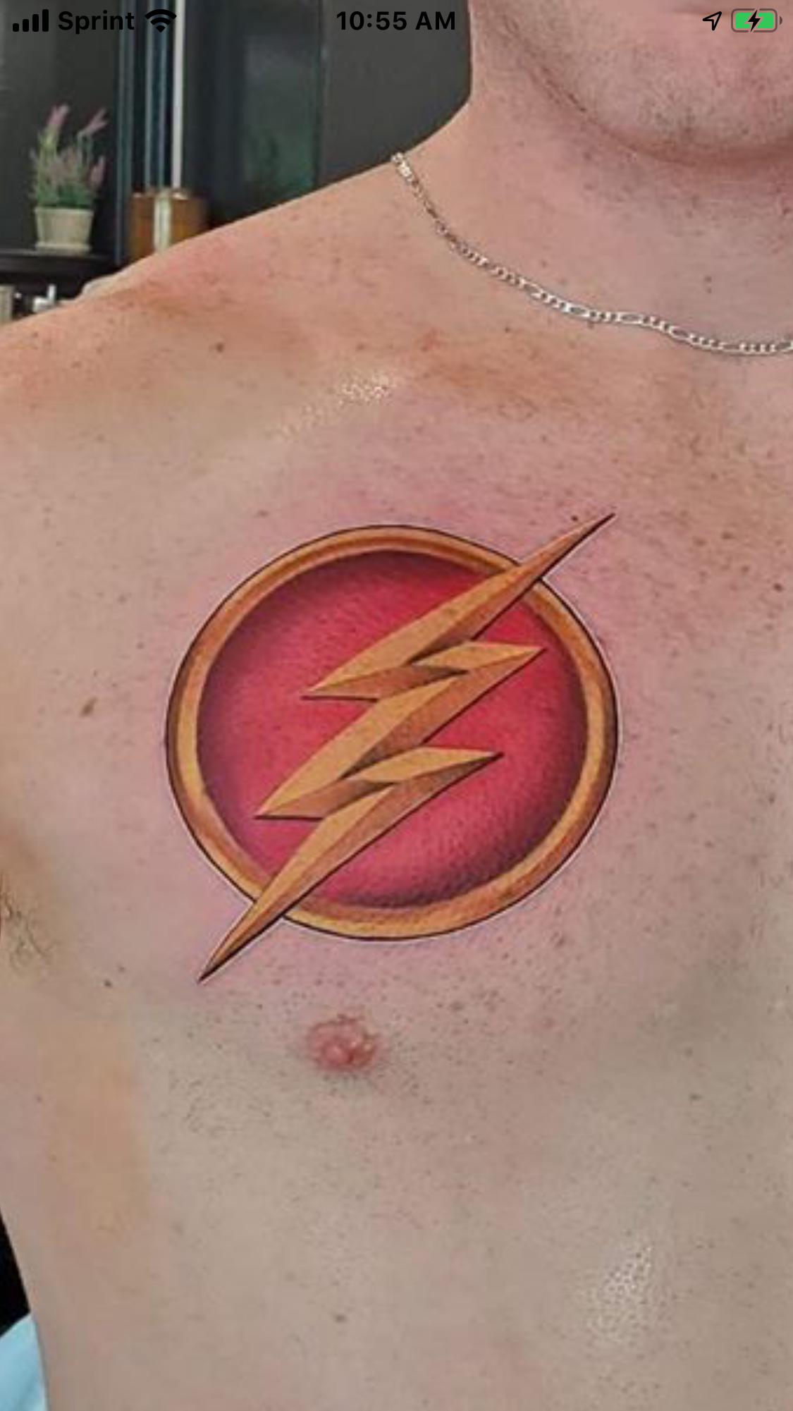 Flash Logo Chest Tattoo